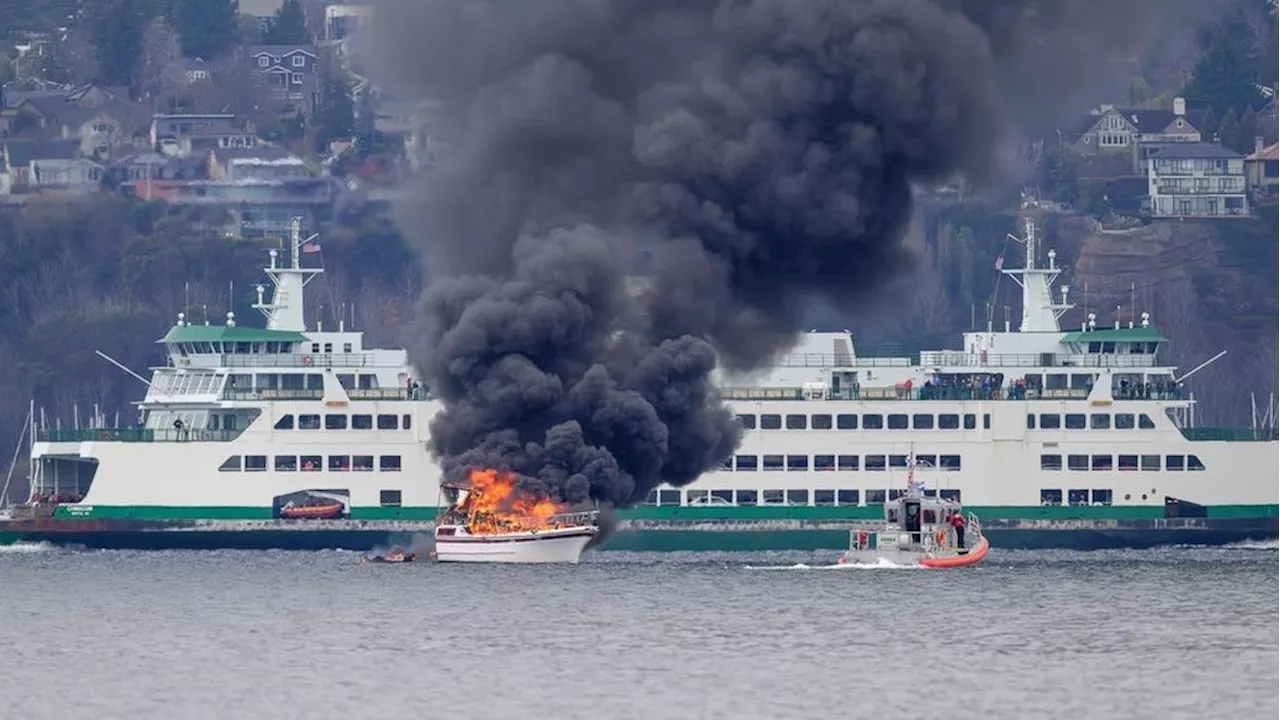 Seattle fire, Coast Guard tow burned boat to shore after rescue in Elliot Bay