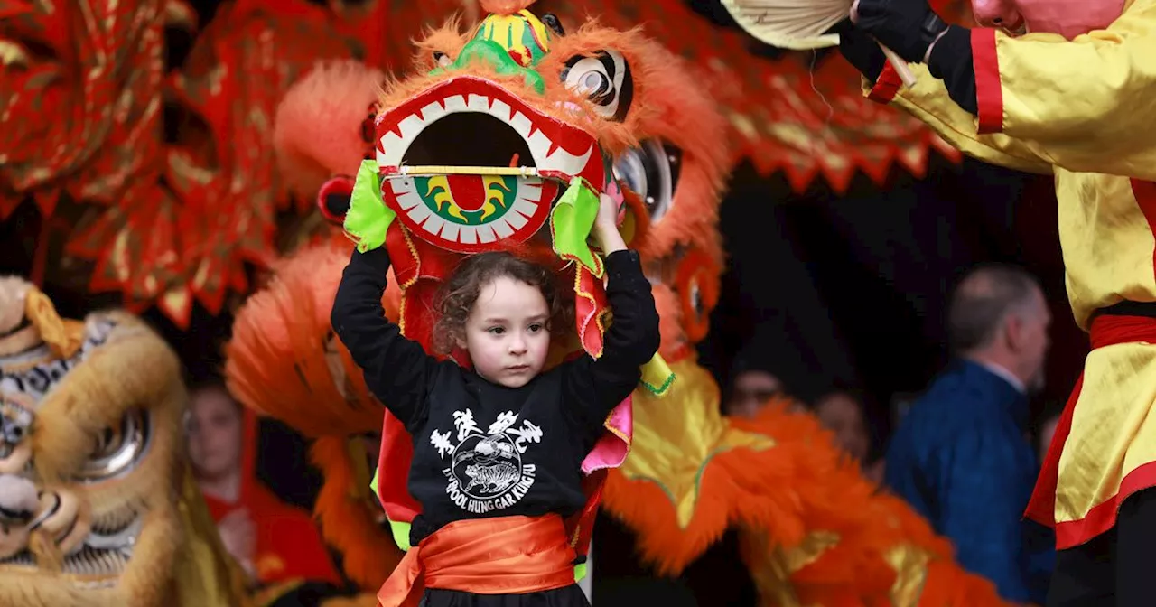 Crowds Celebrate Year of the Dragon in Liverpool's China Town