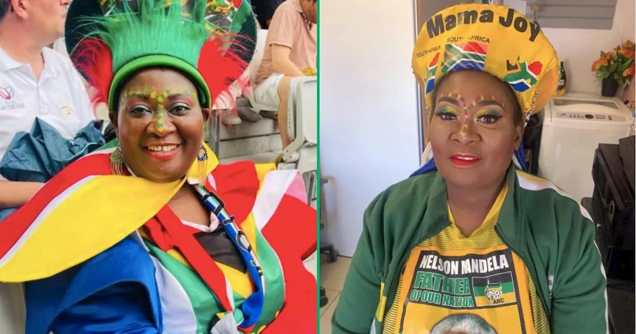 South African Sports Fan Mama Joy Proudly Displays Bafana Bafana's Trophy