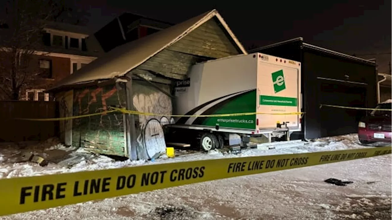 Truck crashes into west-end Toronto garage, leaving man in 60s seriously injured