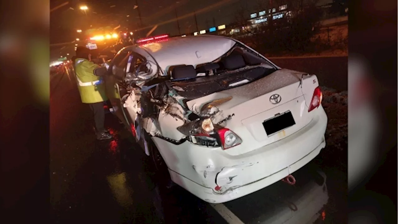 Wrecked vehicle spotted driving along Highway 401 in Toronto