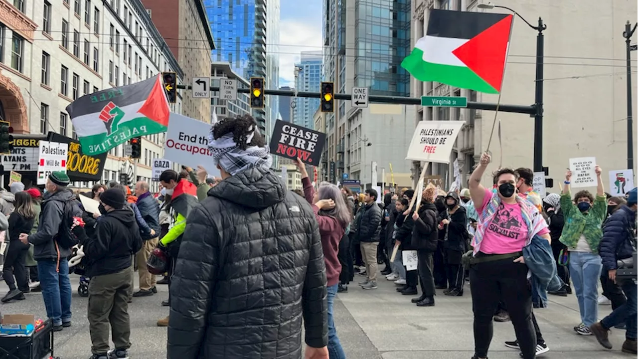 Protestors calling for ceasefire block all lanes to march down 1st Avenue