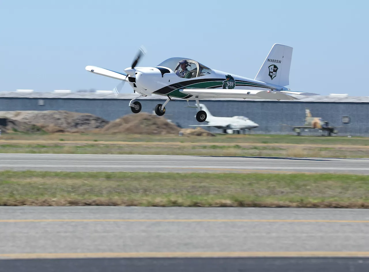 Ready for liftoff: Southwest HS students witness the plane they built soar into the sky