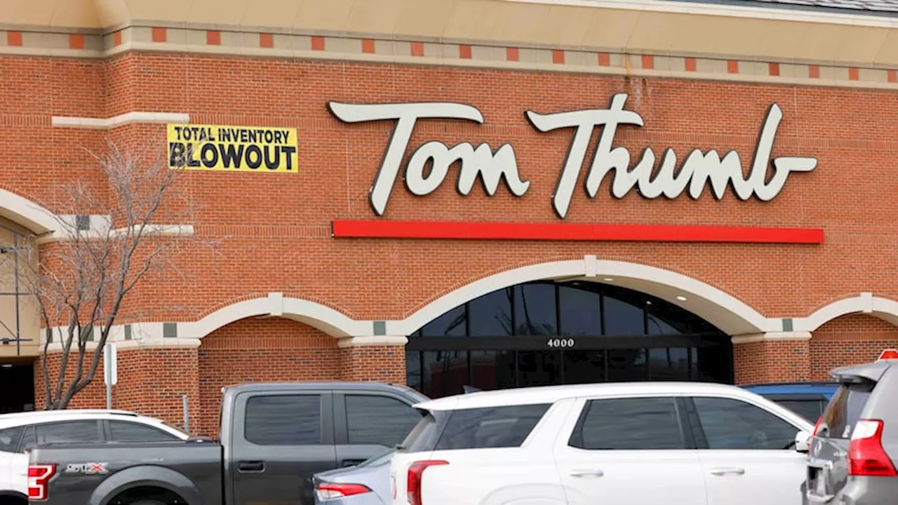 What happened to the dozen D-FW supermarkets sold in the last big grocery merger?