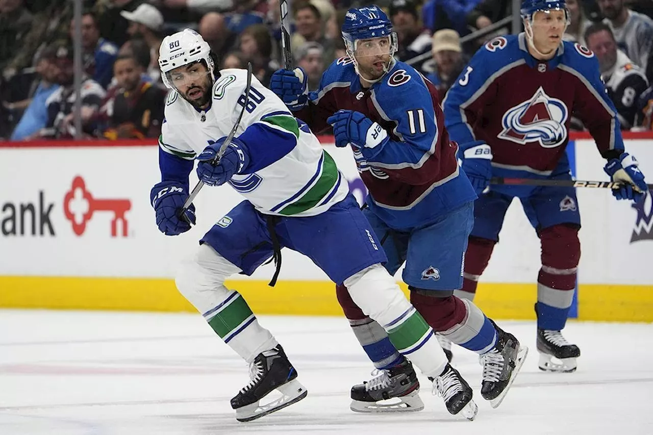 Johansen breaks out of scoring slump with 2 goals, Avs beat Canucks 3-1