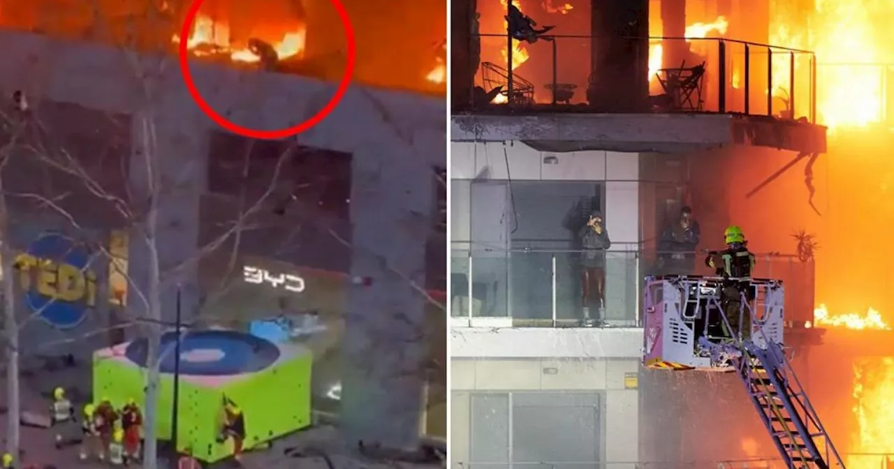 Huge block of flats engulfed by fire amid fears residents could be trapped