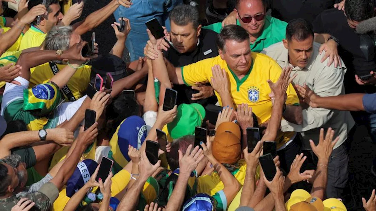 Bolsonaro denies coup plot as thousands rally in support of former Brazilian leader