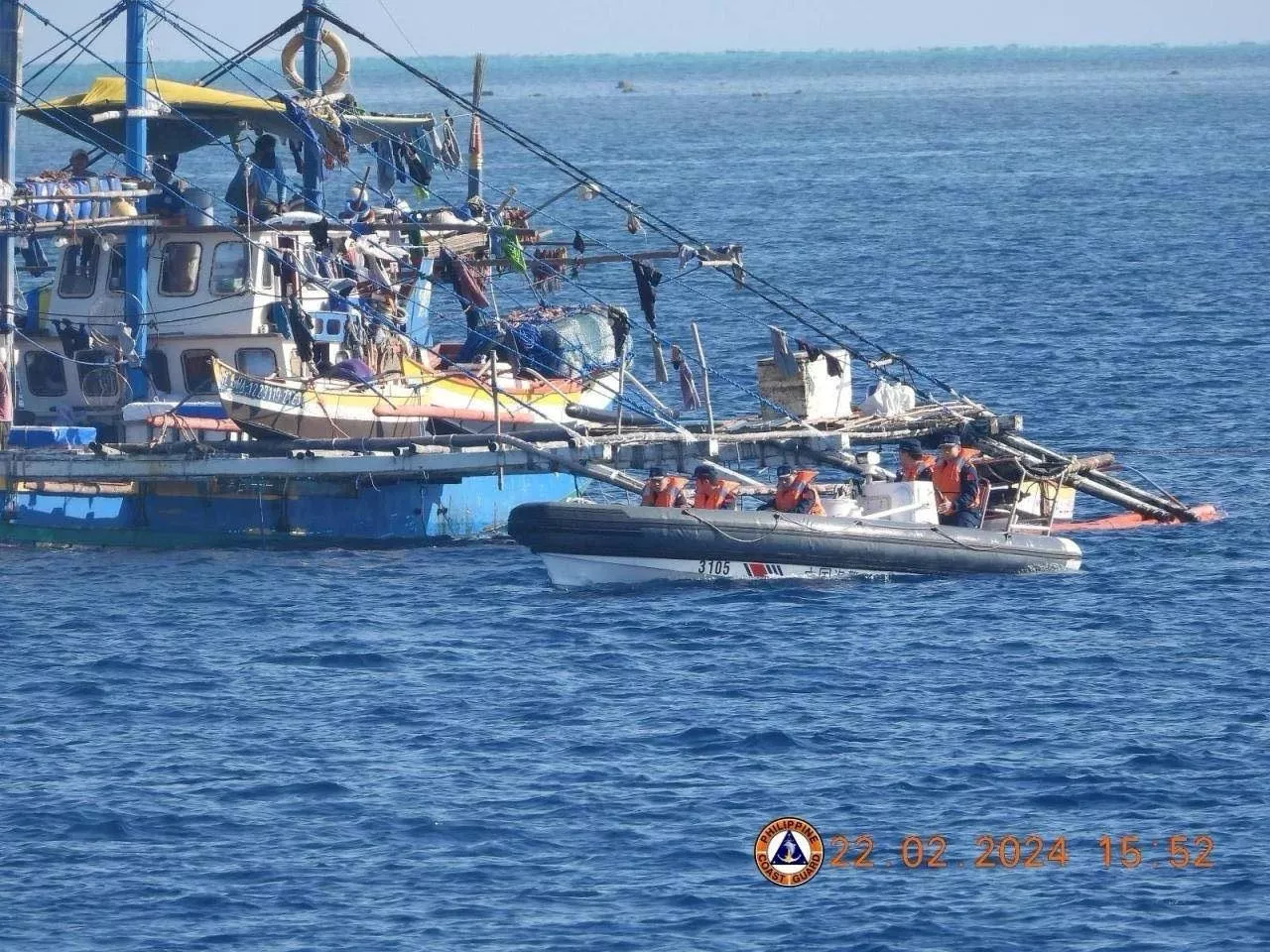 Chinese Coastguard Personnel Shadow Philippine Coast Guard in Scarborough Shoal