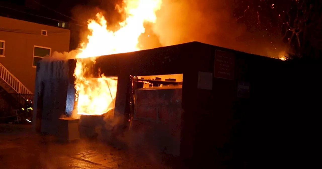 Fire burns garage behind apartment building in Hillcrest