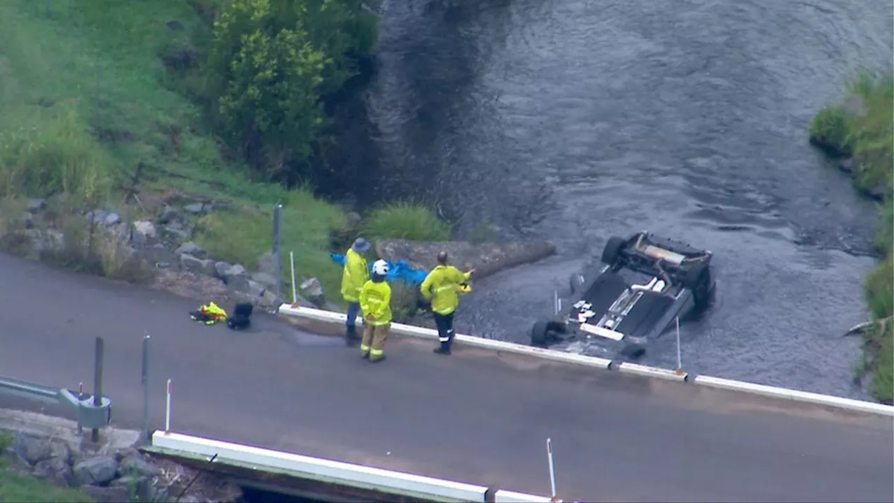 Driver in critical condition after car crashes off bridge into river