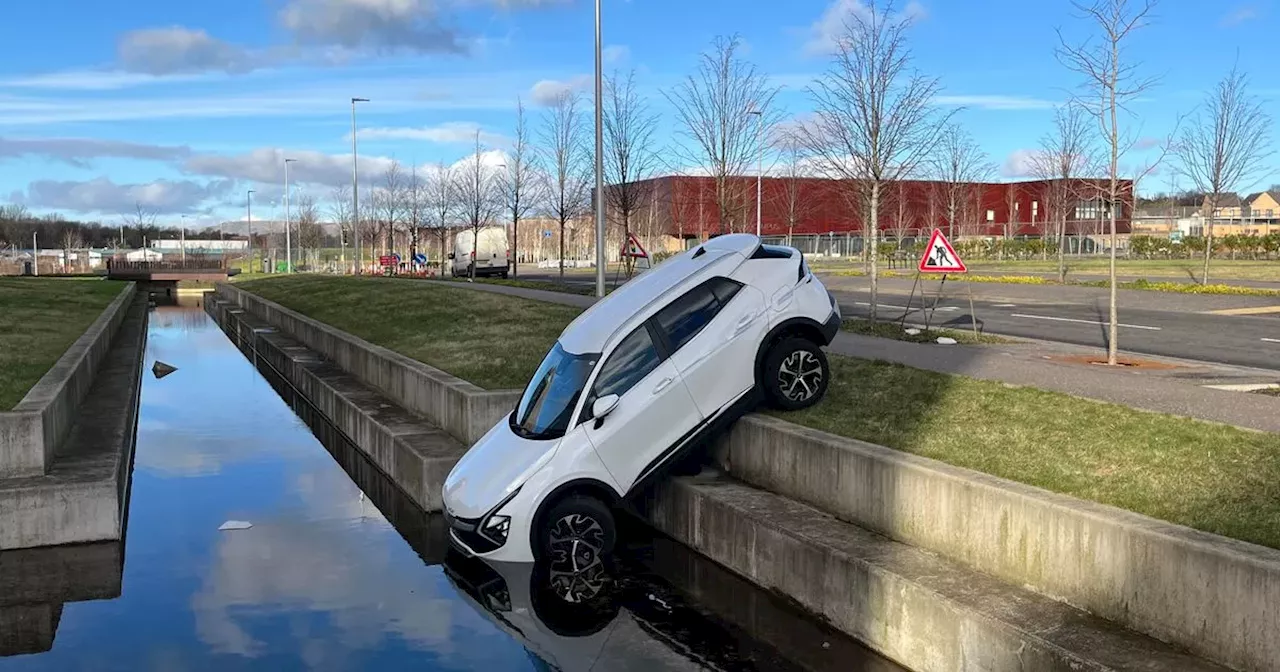 Dramatic video captures moment car ends up in Glasgow canal as police tape off vehicle