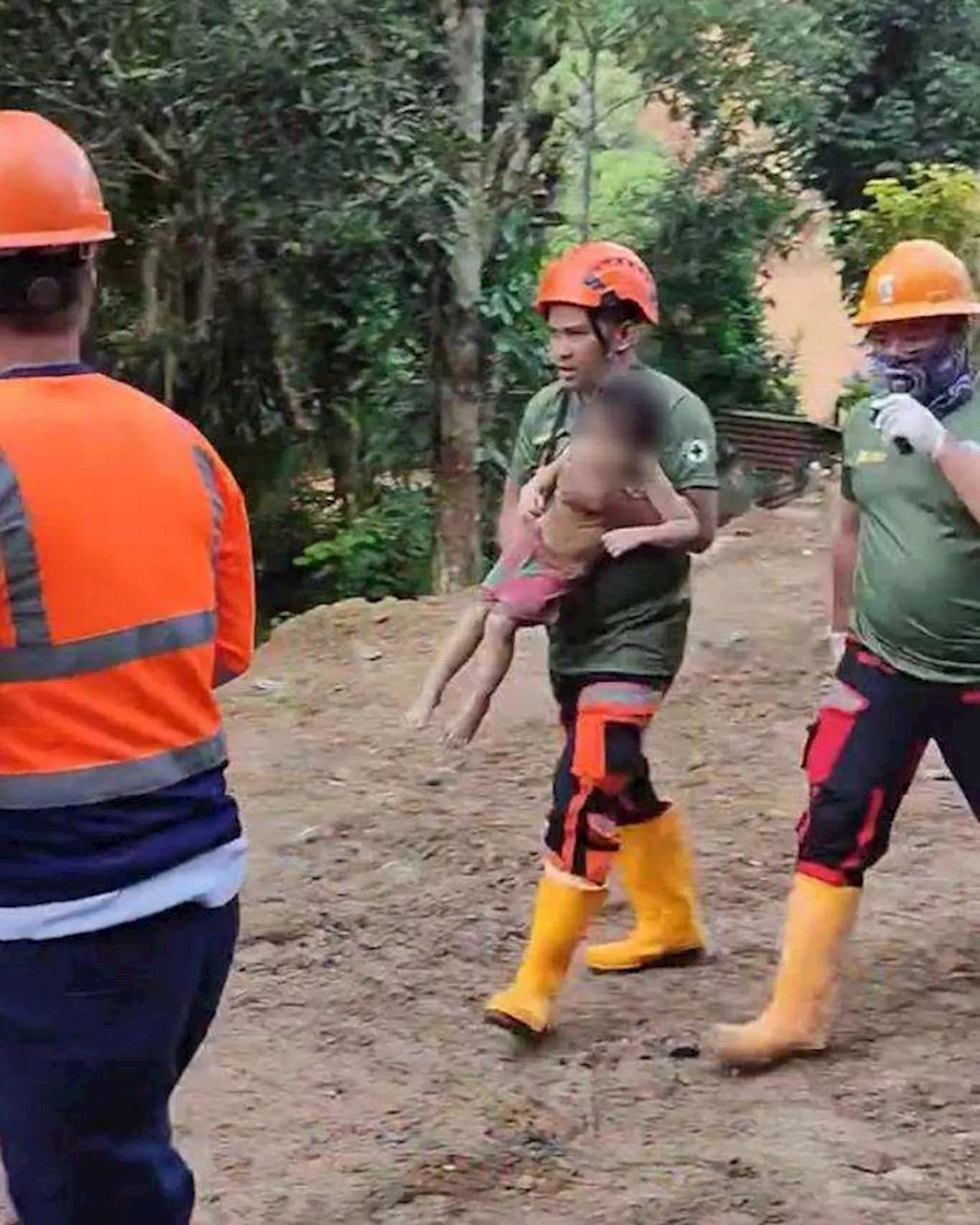 Young girl found alive after landslide in Philippines