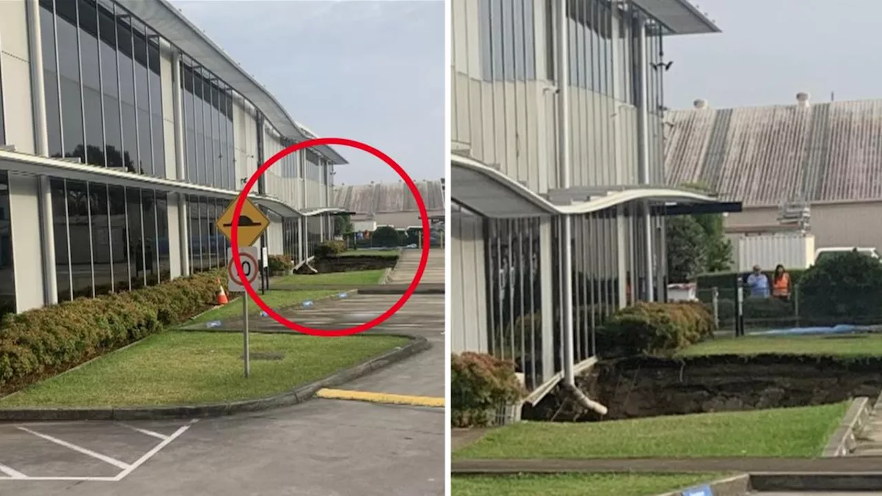 Sinkhole opens up in Sydney, putting Rockdale office block at risk of collapse