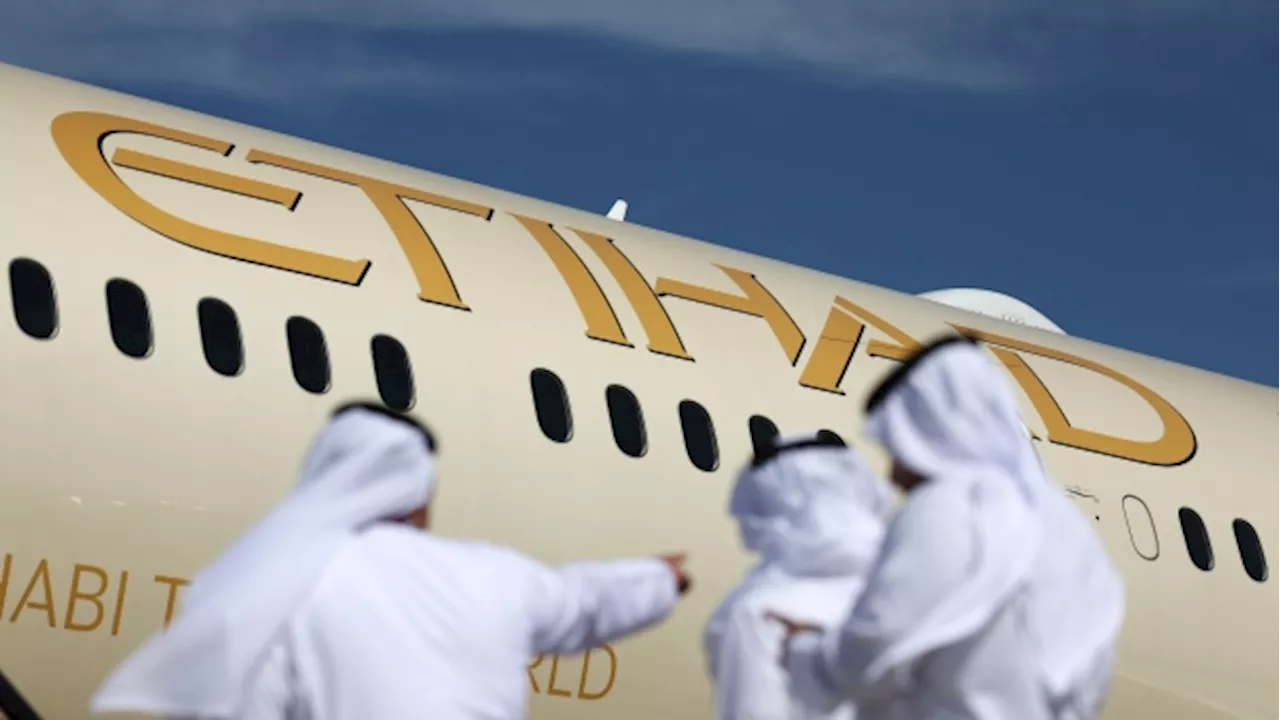 ADQ Said to Explore Etihad Listing in First for Gulf Hub Carrier