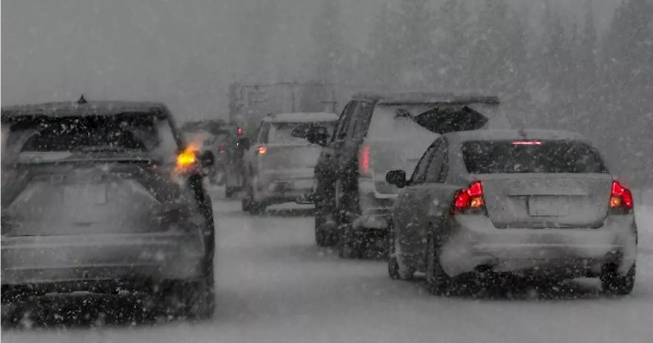 Collision closes Trans-Canada west of Calgary, as snowfall warning issued for the city