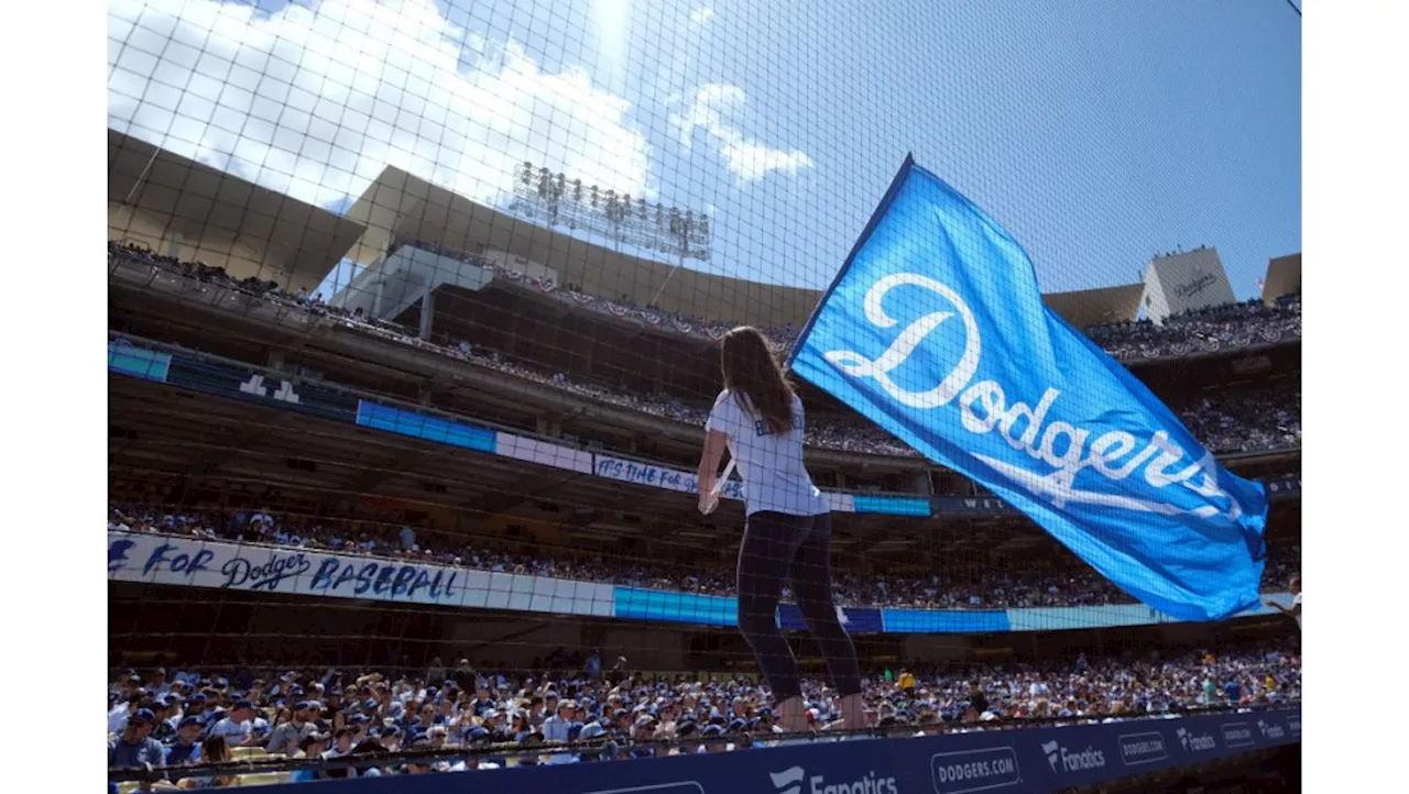 Dodgers sued by fan who says security roughed him up