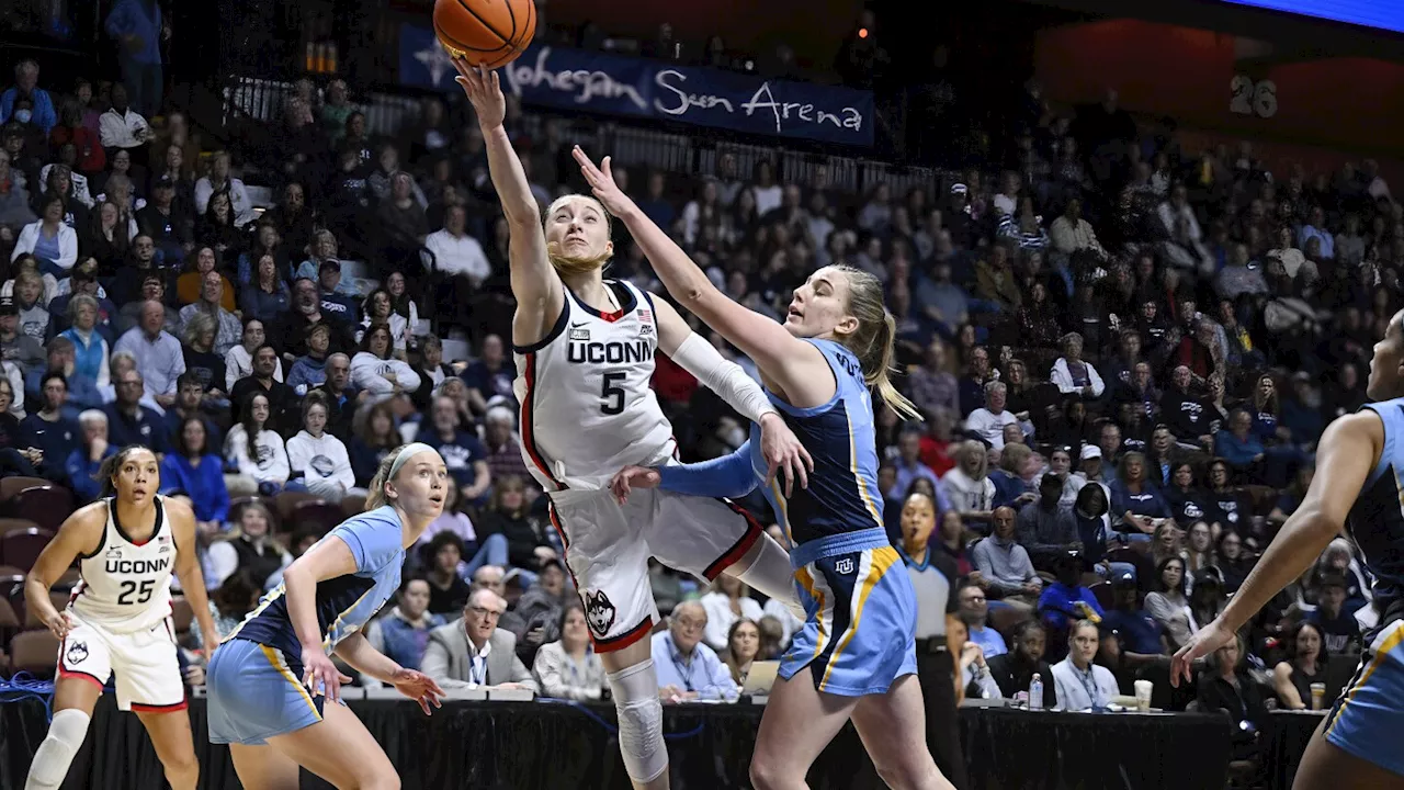 Bueckers scores 27 points and shorthanded UConn beats Marquette 58-29 in the Big East semifinals