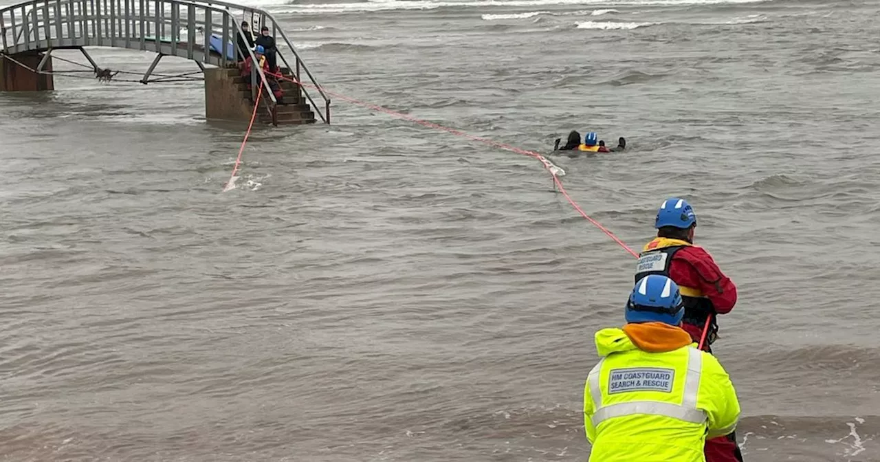 Major rescue operation launched after five surfers swept out to sea