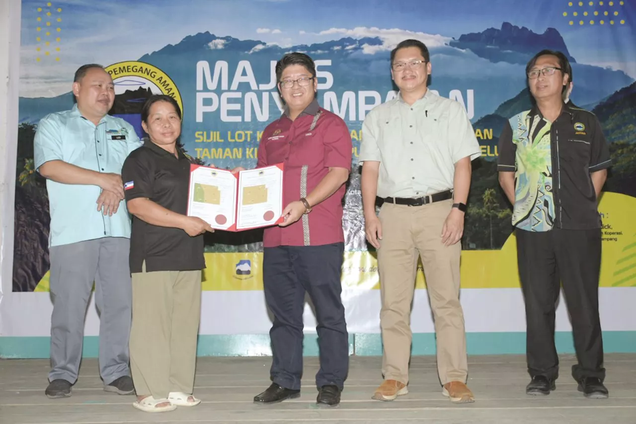 Set up a co-operative, Kg Sayap Community Lot recipients told