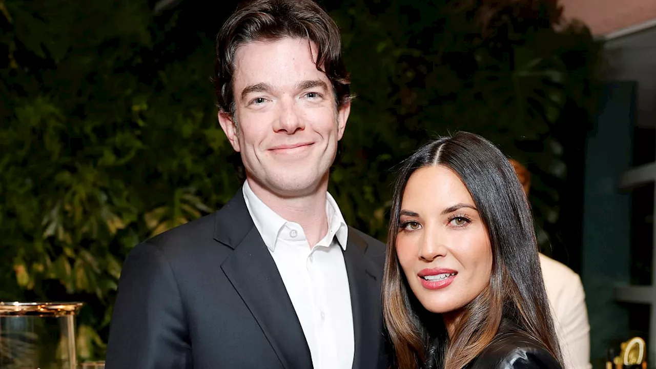 Olivia Munn and John Mulaney cuddle at the Chanel pre-Oscar dinner amid news he is 'not mentioned'...