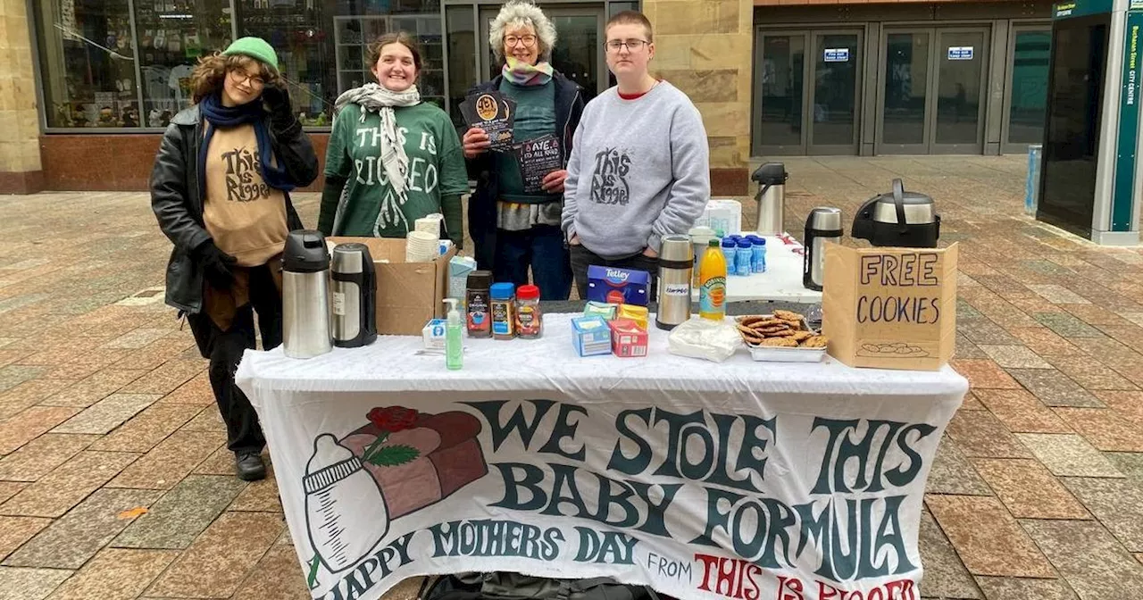 This is Rigged hand out 'stolen' baby formula and goods on Glasgow's Buchanan Street