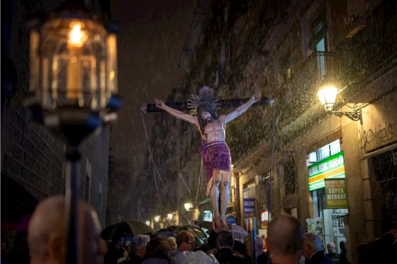 A religious procession in Barcelona celebrates rain during a severe drought in northeast Spain