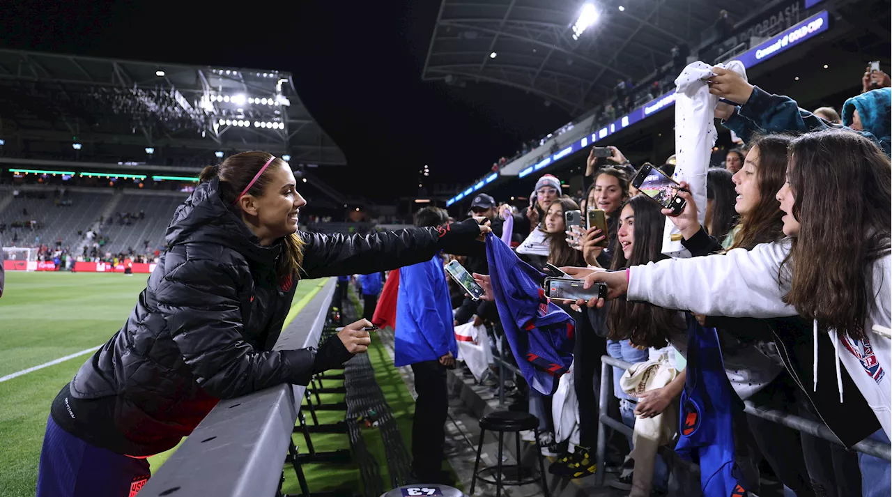 Baby holding hard seltzer can during USWNT-Colombia game goes viral