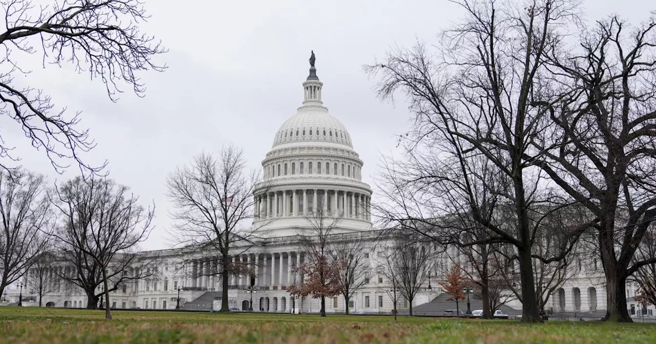 Biden signs a package of spending bills passed by Congress just hours before a shutdown deadline