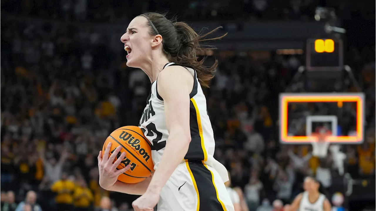 Clark, Iowa rally past Nebraska to win Big Ten title game