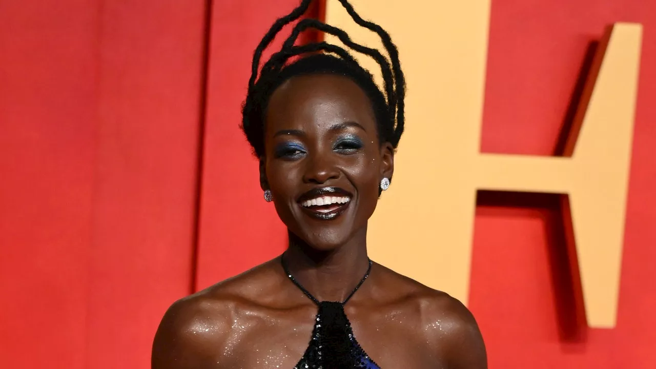 Lupita Nyong’o And Her Majestic Locs Brought Statement Beauty To An Otherwise Muted Oscars