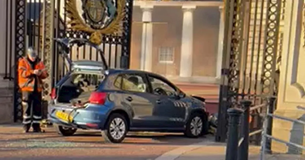 Car crashes into Buckingham Palace gates as man arrested