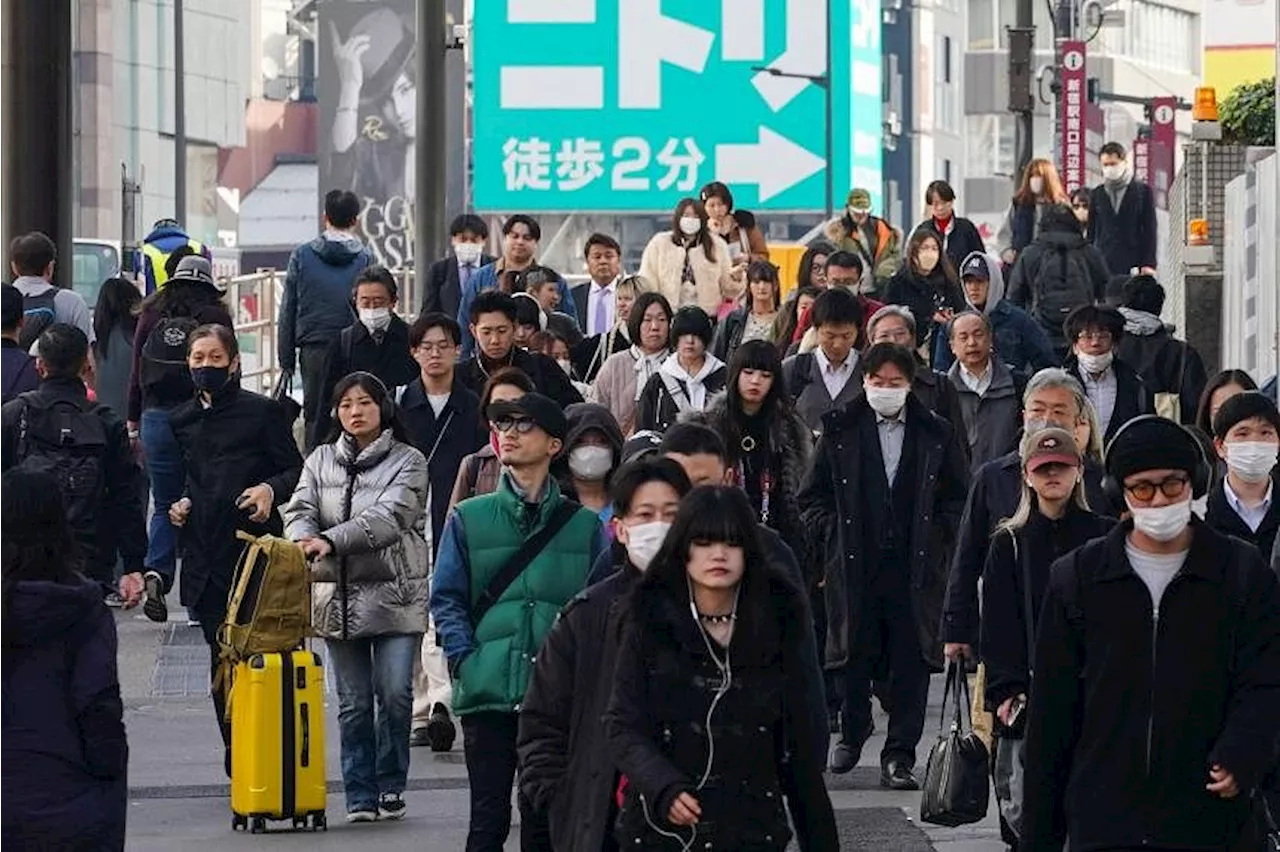 Japan’s economy avoids recession one week before BOJ meeting