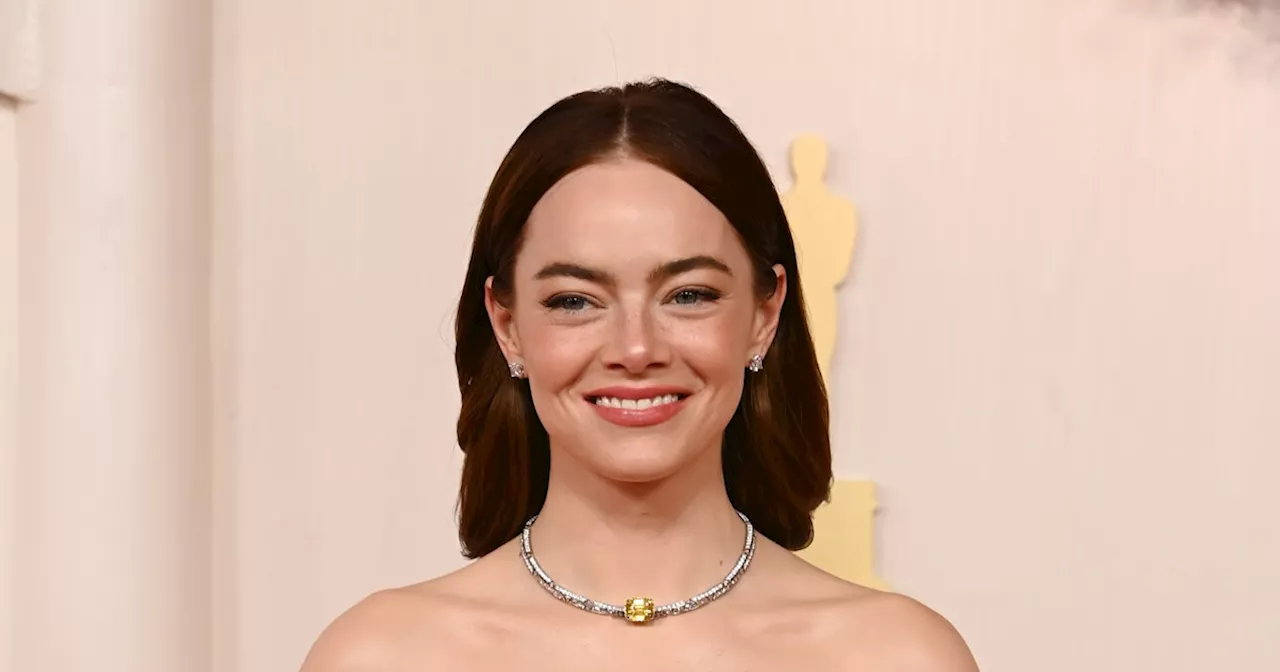 Emma Stone Reinvents The Peplum Gown On The 2024 Oscars Red Carpet