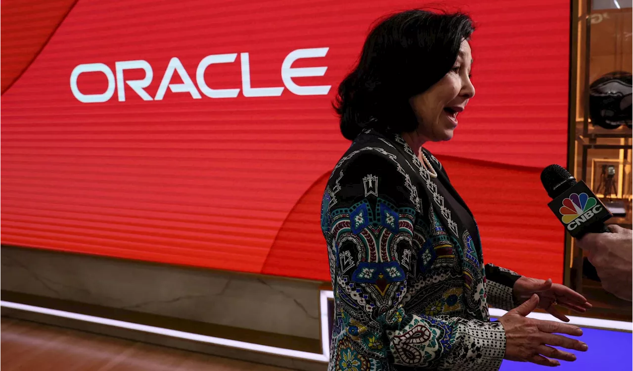 Oracle shares surge almost 12% and close at a record