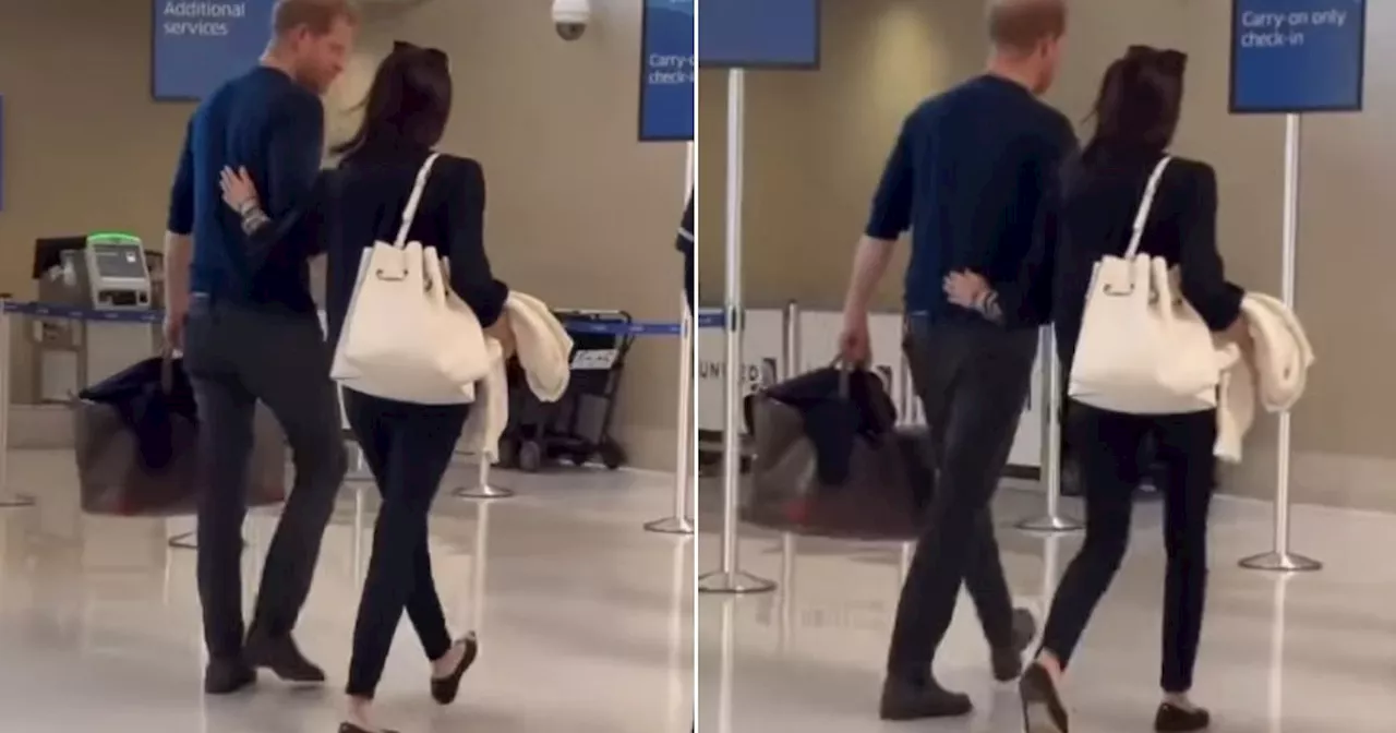 Meghan 'steers' Harry in 'dominant' way as they're seen passing through airport