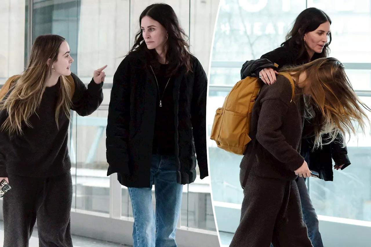 Courteney Cox and daughter Coco Arquette, 19, appear to have heated conversation at London's Heathrow Airport