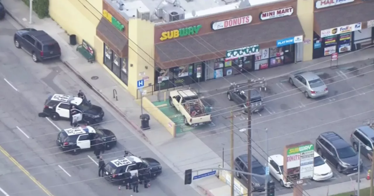 Man armed with chainsaw arrested after hours-long standoff in bed of truck in Mission Hills