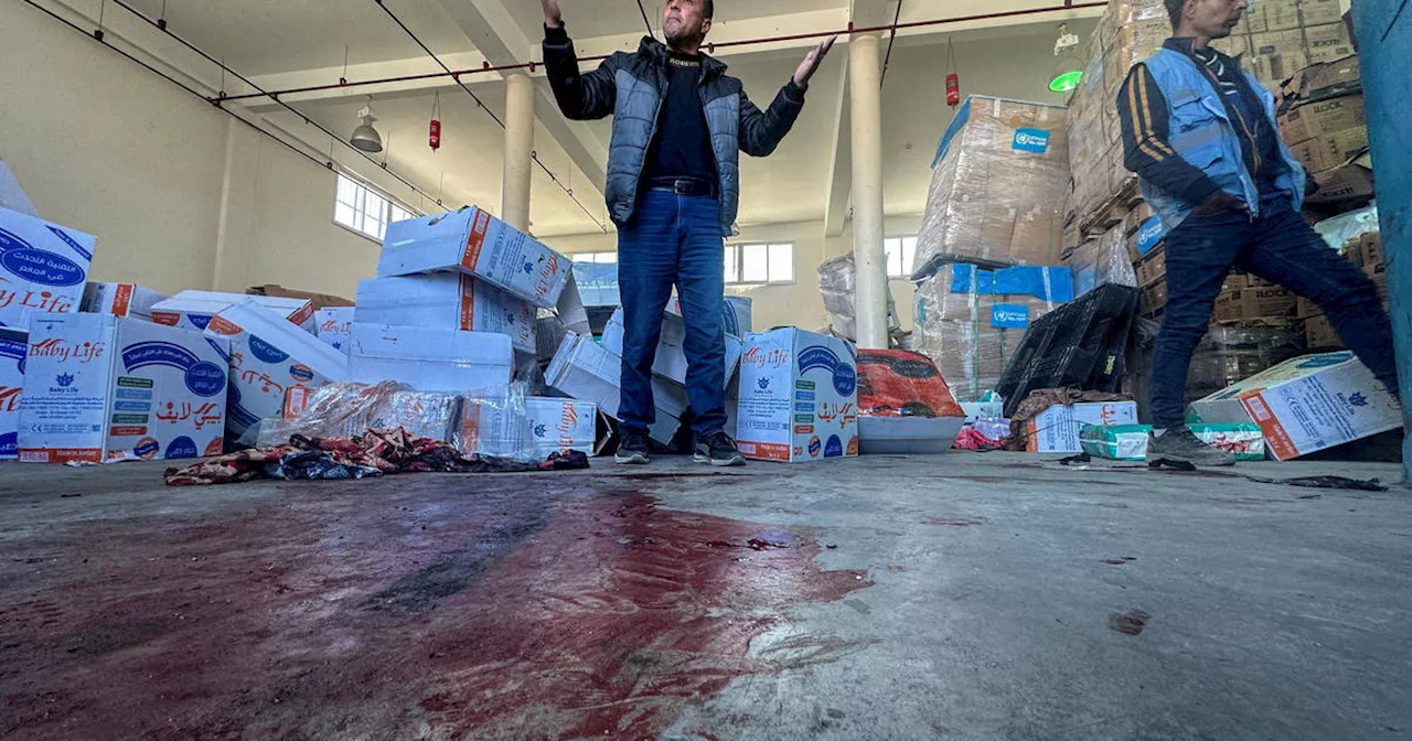 UNRWA says Israeli strike hit Gaza food aid center, killing 1 staffer and wounding 22 others