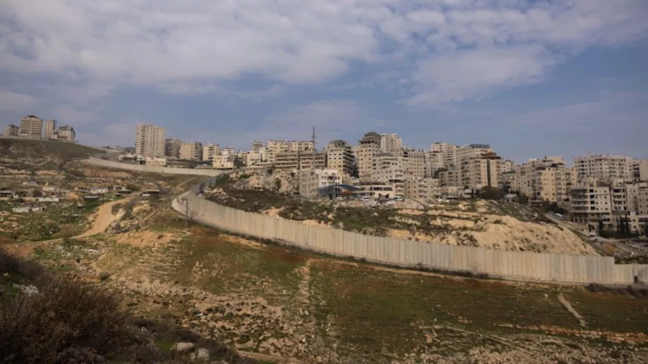 Palestinian boy with firework, 12, shot dead by Israeli border police at east Jerusalem refugee camp