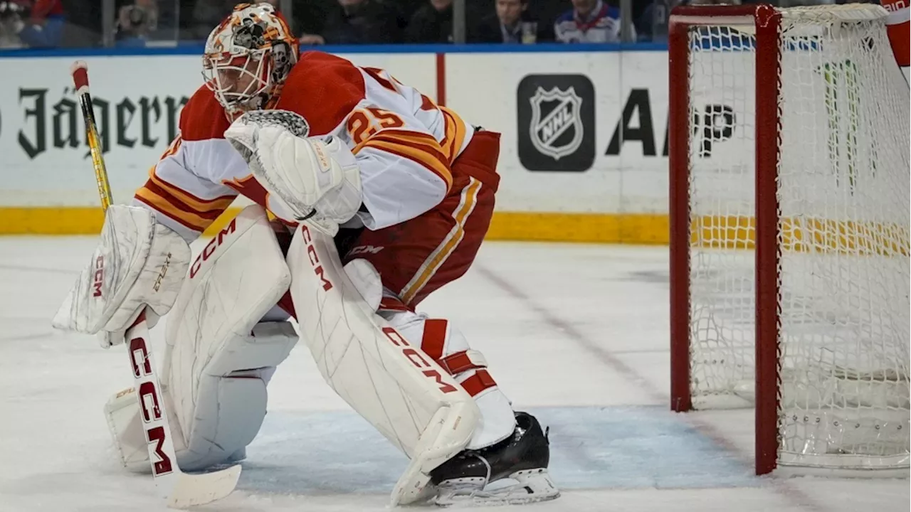 Calgary Flames list goalie Markstrom day-to-day with lower-body injury, recall Wolf