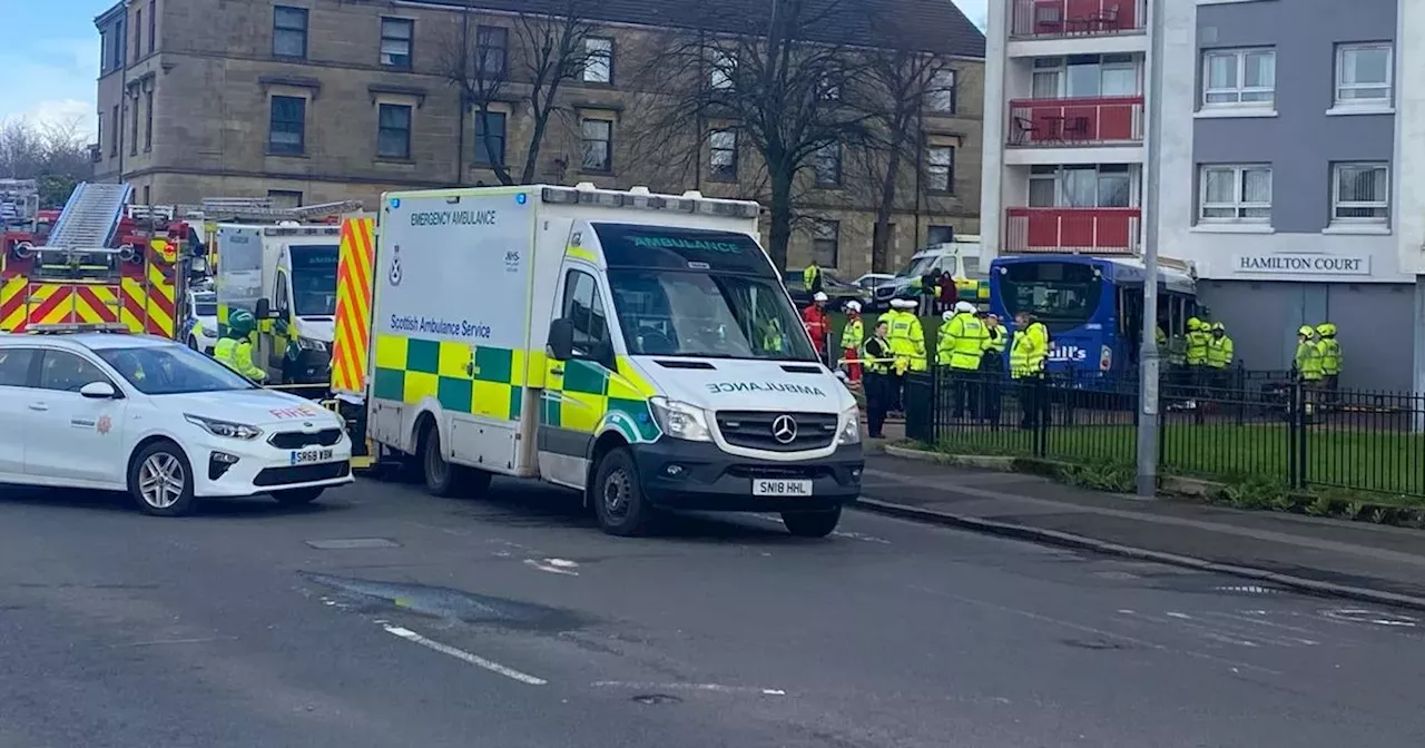 Five people injured after bus crashes into Paisley block of flats