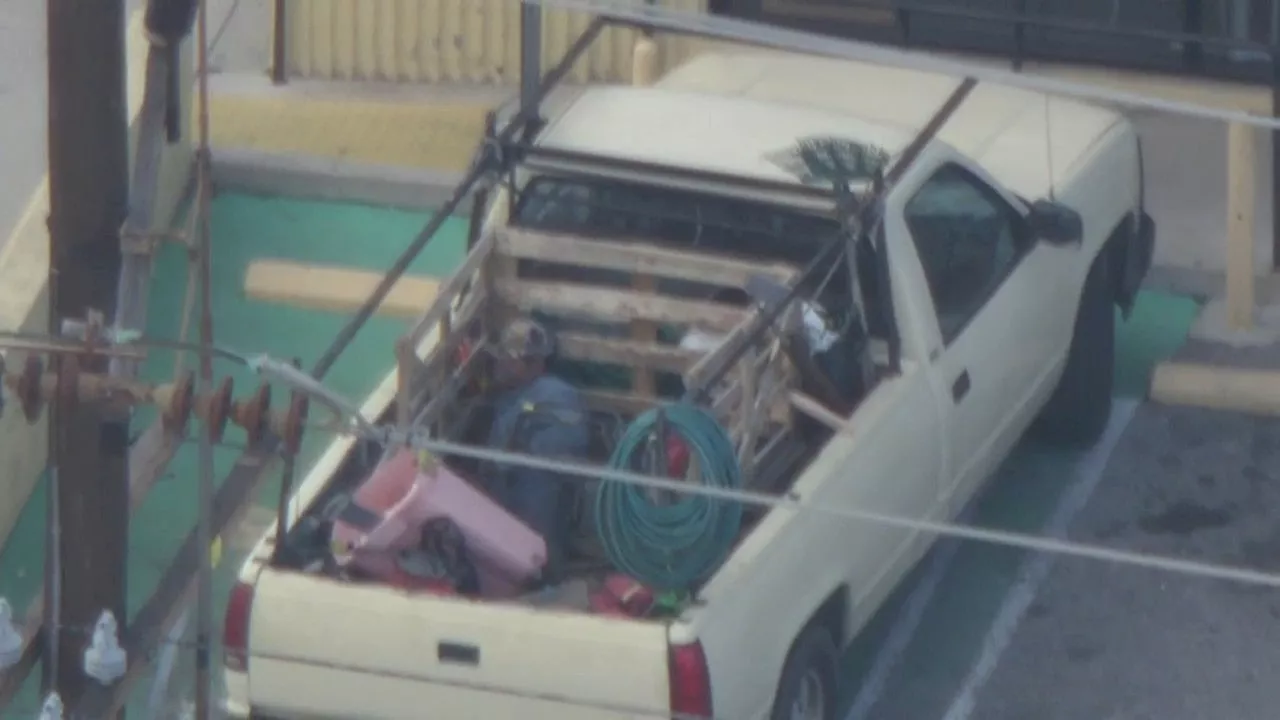 Man accused of carrying chainsaw hides under laundry basket in standoff with LAPD in Mission Hills