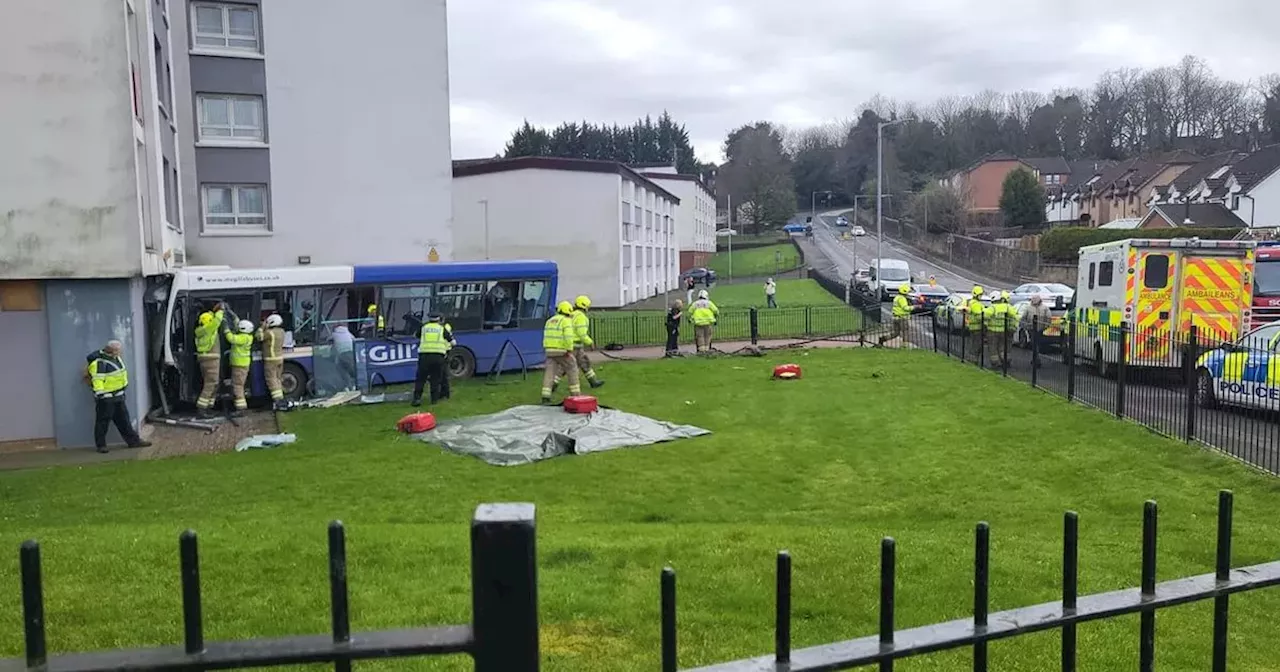 Bus crashes into block of flats in Paisley as emergency crews swarm scene