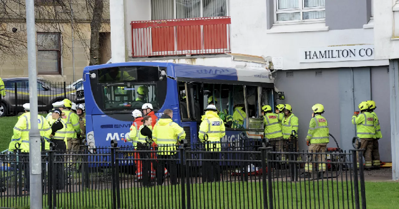 Bus crashes into block of flats in Paisley