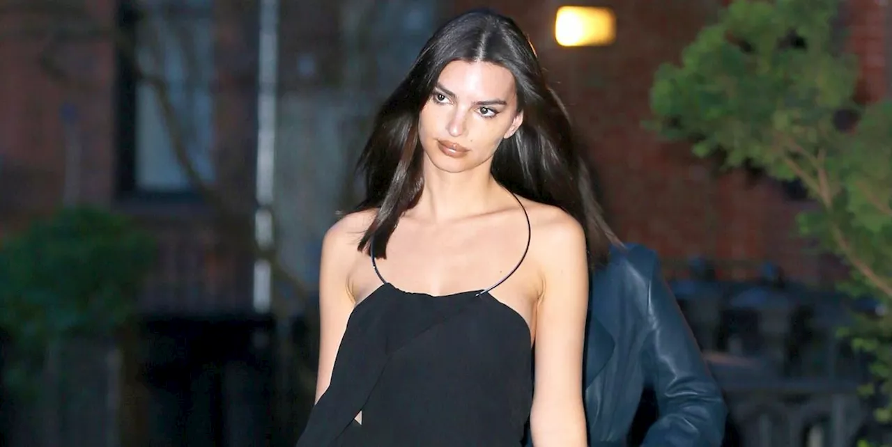 Emily Ratajkowski Turns Up the Heat in a Slinky Black Dress With Thigh-High Leather Boots