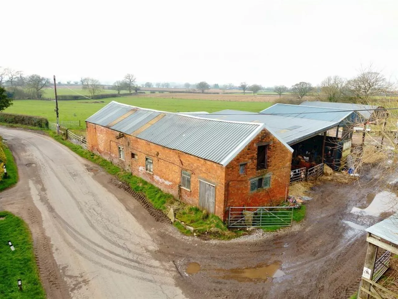 Two barns with permission to be converted into homes up for sale at north Shropshire farm