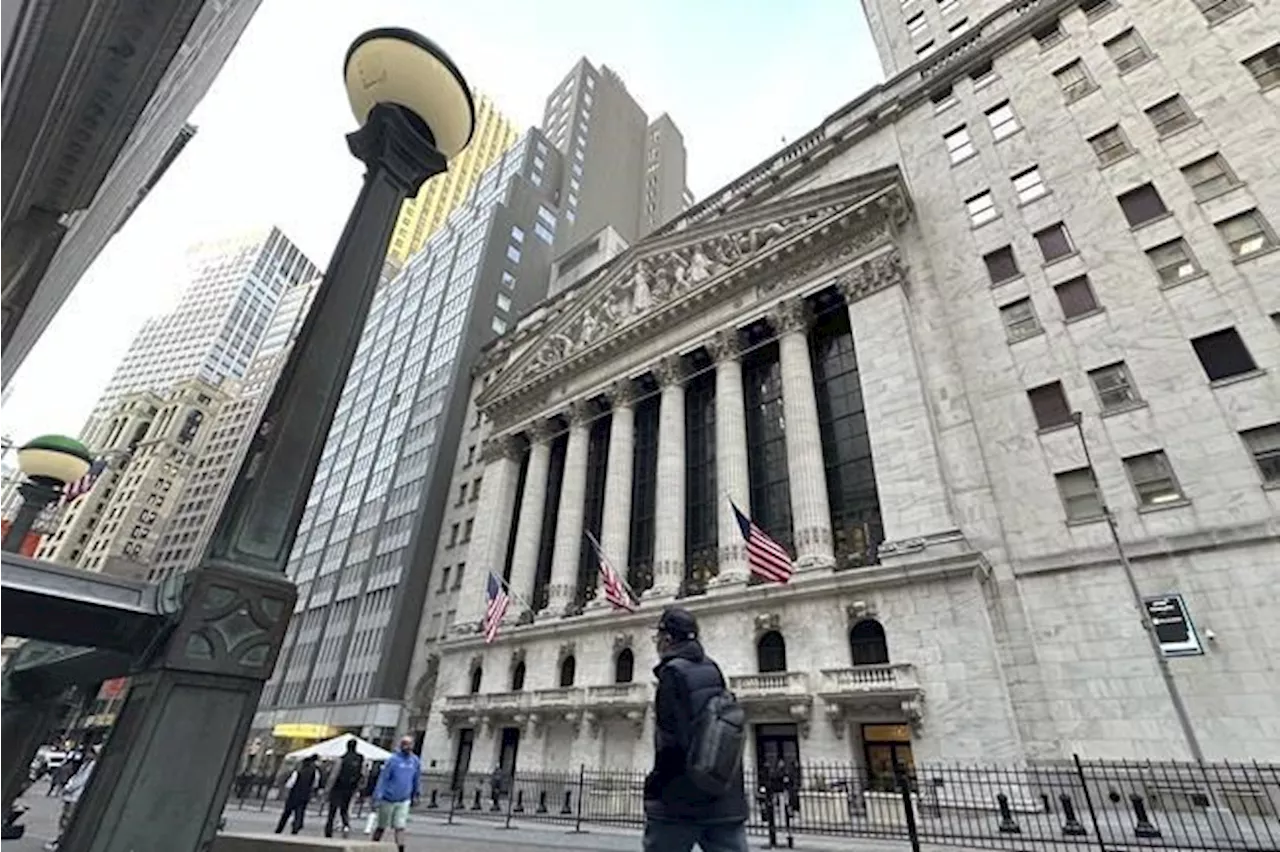 Stock market today: Wall Street drifts to a mixed close, holding near record levels