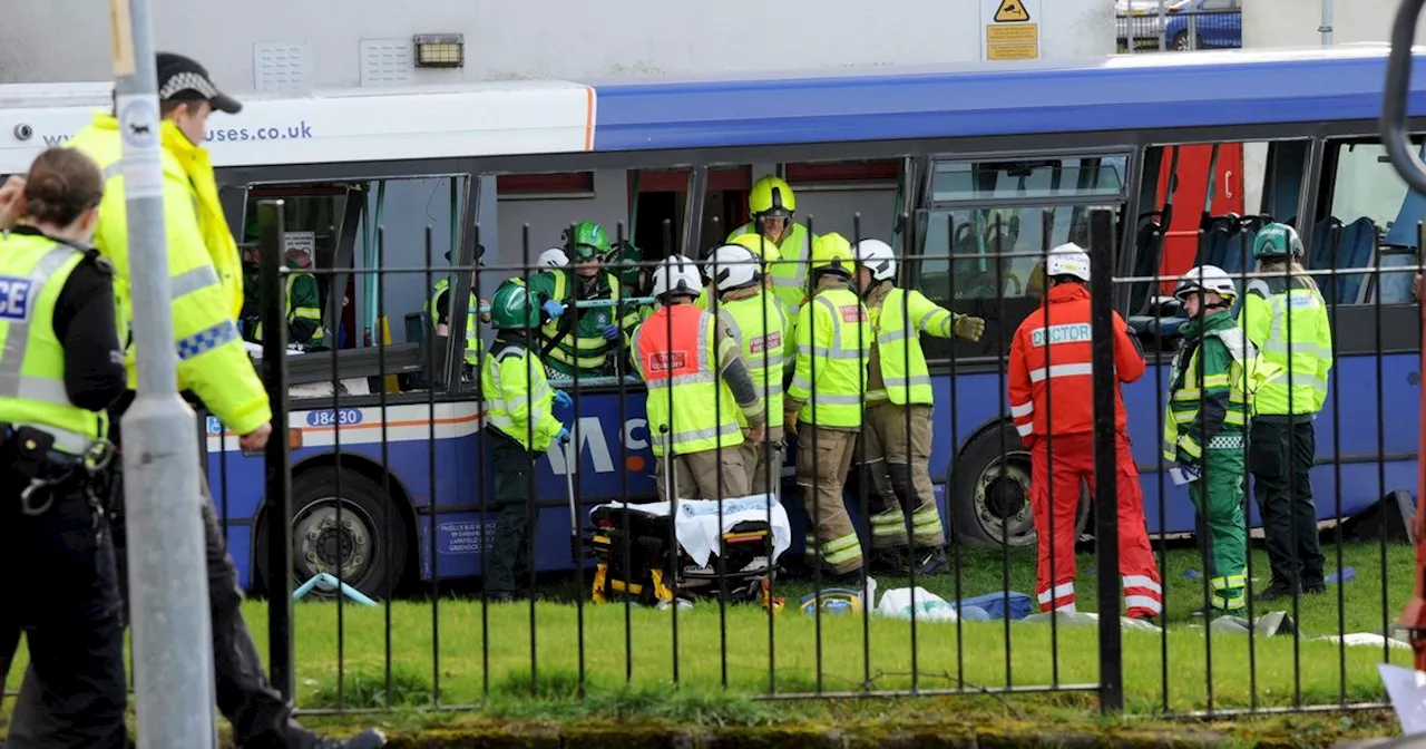 Bus crashes into block of flats in Paisley