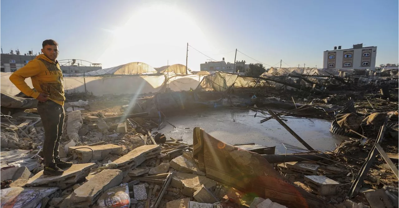 Attack kills 20 and injures 155 at Gaza food aid point, as Israel denies responsibility