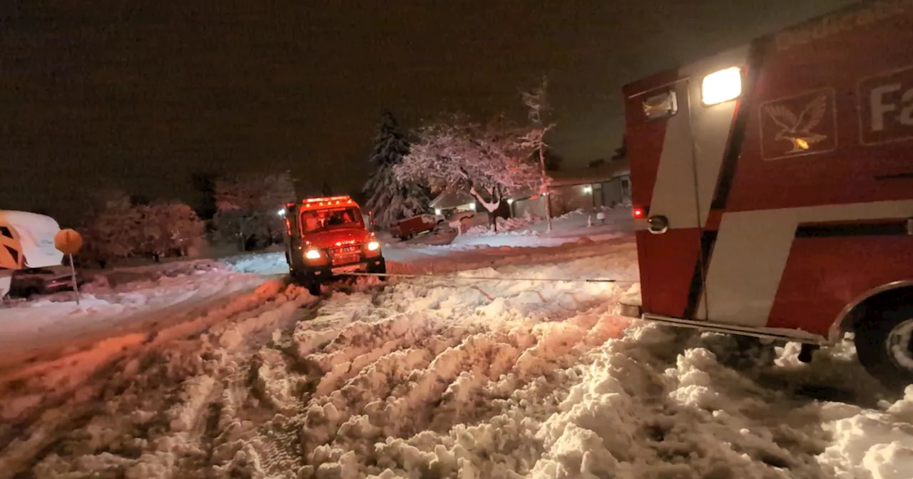 'Proud to serve our community in any circumstance': Aurora firefighters rescue 2 ambulances stuck in snow